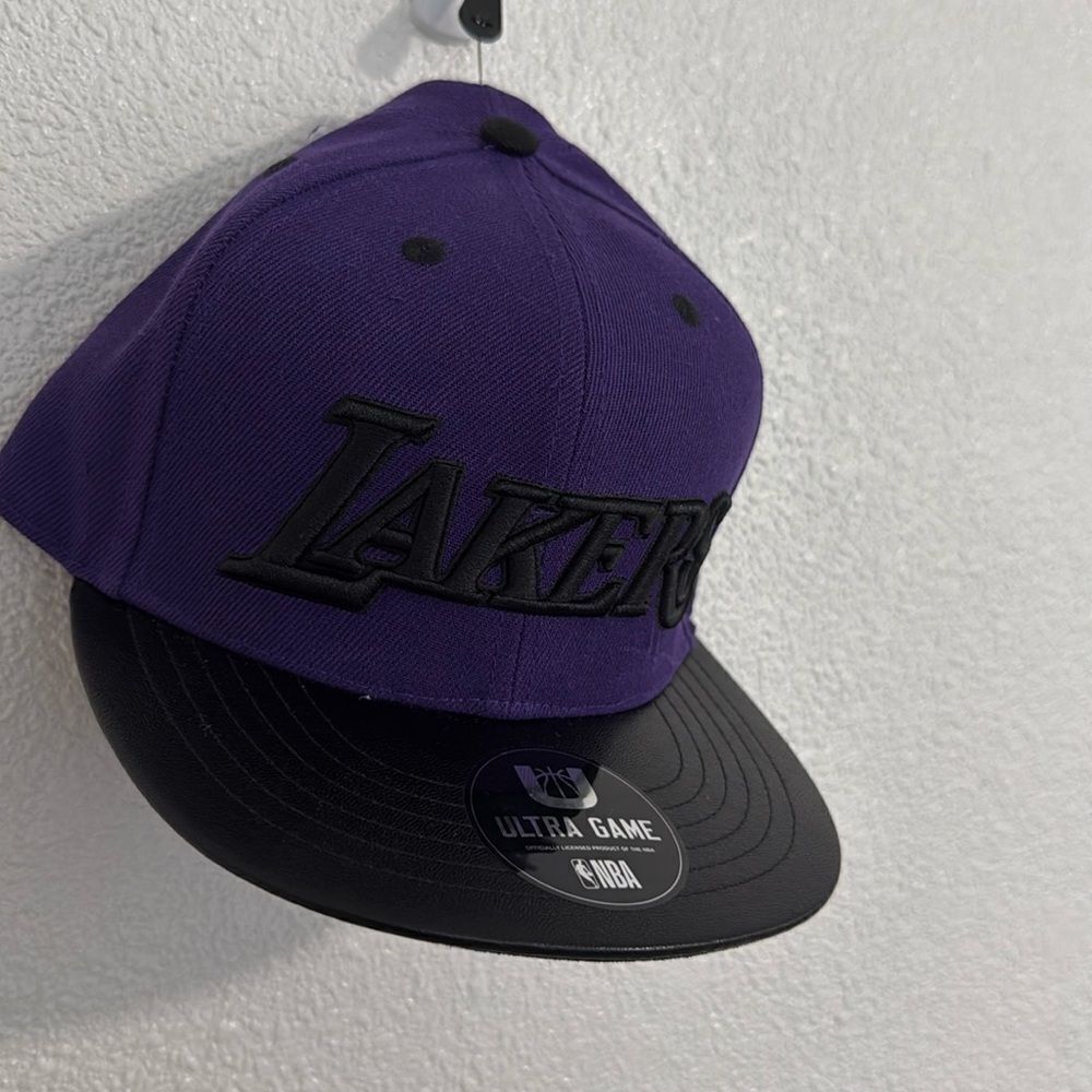 Official NBA- Lakers-purple and black snap back embroidered logo hat